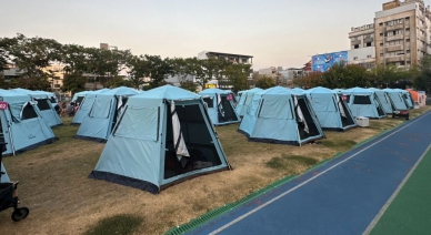 彰化縣府在溪湖鎮湖北國小舉辦「災民夜宿體驗」。（照片縣府提供）