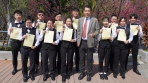 大葉助理教授陳俊華（右5）指導烘焙學程11名學生，通過飲調乙級技術士證照。（照片大葉提供）